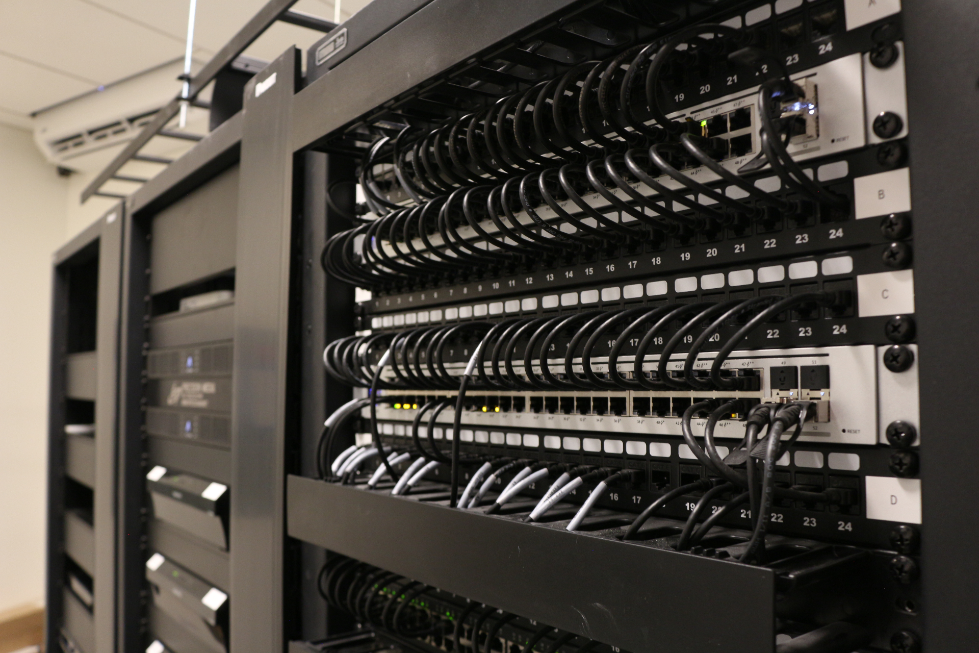 Residential network rack with neatly dressed patch cabling